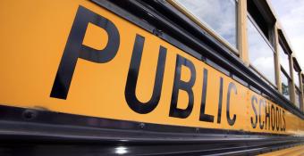 close-up shot of a yellow public school bus